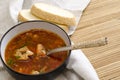 Traditional Ukrainian Russian vegetable soup borscht, with hard cream. parsley rye bread rolls Royalty Free Stock Photo