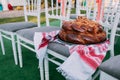 Traditional Ukrainian wedding bread loaf in wedding ceremony area