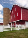Traditional US red painted barn on farm Royalty Free Stock Photo