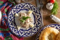 Uzbek Tashkent salad with beef, Daikon radish, eggs and fried onions