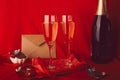 Traditional Valentines day background aesthetic. Seasonal red romantic dinner with gift, postcard, champagne and