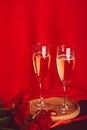 Traditional Valentines day background. Red roses, champagne glasess, chocolate candies - romantic dinner Royalty Free Stock Photo