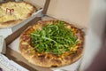 Traditional vegetarian pizza in cardboard box