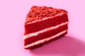 Traditional velvet cake portion on pink background