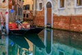 Gondola in picturesque canal in Venice Italy Royalty Free Stock Photo