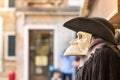 Traditional venetian mannequin in Plague doctor costume, mask and hat Royalty Free Stock Photo