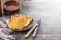 Traditional Venezuelan beef cachapa on wooden table Royalty Free Stock Photo