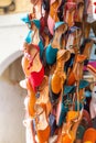 Traditional vibrant Moroccan slippers - `babouches` on the market in Fez, Morocco. Vertical Royalty Free Stock Photo