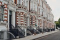 Traditional Victorian houses with stoops in Kensington, London, UK