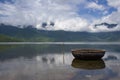 Traditional Vietnamese basket boat in the calm bayou, Hai Van pass, Central Vietnam. Royalty Free Stock Photo