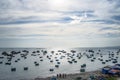 Traditional Vietnamese boat in the basket shaped on fishing port at Fishing village in sunset sky , Binh Thuan, Vietnam. Landscape Royalty Free Stock Photo