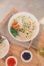 Traditional vietnamese noodle soups pho in bowls, concrete background. Vietnamese beef soup pho bo, Close-up. Asian/vietnamese Royalty Free Stock Photo