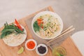 Traditional vietnamese noodle soups pho in bowls, concrete background. Vietnamese beef soup pho bo, Close-up. Asian/vietnamese Royalty Free Stock Photo