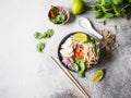 Traditional Vietnamese soup- pho ga in bowl with chicken and rice noodles, mint and cilantro, red onion, chili, bean sprouts and Royalty Free Stock Photo