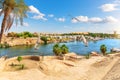 Traditional view of Aswan by the Nile river and sailboats, Egypt Royalty Free Stock Photo