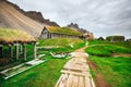 Traditional Viking village. Wooden houses near the mountain first settlements in Iceland.