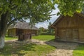 Traditional village house with blue sky, green grass, fence and trees. Ukraine. Traditional village house with blue sky, green Royalty Free Stock Photo