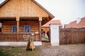 Traditional village wooden farm house in winter, historic country-style architecture in Skanzen, Polabi open-air ethnographic