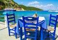 Blue table at Frikes port Ithaca island Ionian Sea Greece Royalty Free Stock Photo