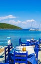 Blue table at Frikes port Ithaca island Ionian Sea Greece Royalty Free Stock Photo