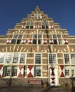 A traditional vintage old dutch house with stepped rooftops and old vintage window shutters in Leiden Royalty Free Stock Photo