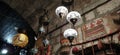 Traditional vintage Turkish lamps over light background in the night. Colored glass lamps and shades on the market in Sarajevo,
