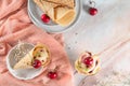 Traditional waffle cones with ice cream and cherry fruits on marble stone surface Royalty Free Stock Photo