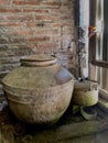 a traditional water container in the village made of cement is called a gentong Royalty Free Stock Photo