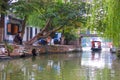 Traditional water taxi travels under the bridge, Zhujiajiao, China Royalty Free Stock Photo