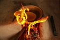 Traditional way of making food cooking on open fire using firewood in a rural village , near Kajiraho,India Royalty Free Stock Photo