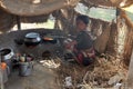 Traditional way of making food on open fire in kitchen, village Kumrokhali, India Royalty Free Stock Photo