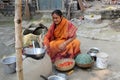 Traditional way of making food on open fire in a village, Kumrokhali, West Bengal, India Royalty Free Stock Photo