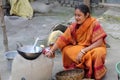 Traditional way of making food on open fire in a village, Kumrokhali, West Bengal, India Royalty Free Stock Photo