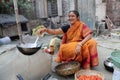 Traditional way of making food on open fire in a village, Kumrokhali, West Bengal, India Royalty Free Stock Photo