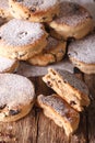 Traditional Welsh cakes with raisins and powdered sugar macro. v