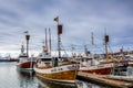 Traditional whale watching boats lying in the harbor of Husavik