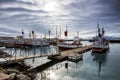 Traditional whale watching boats lying in the harbor of Husavik