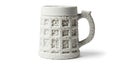 Traditional white ceramic beer stein with embossed pattern and sturdy handle Royalty Free Stock Photo