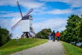 Traditional white windmill at the historical Bruges town