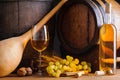 Traditional white wine and barrels Royalty Free Stock Photo