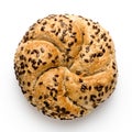 Traditional whole wheat kaiser roll with linseeds and sesame seeds isolated on white. Top view Royalty Free Stock Photo