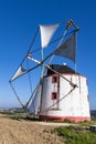 Traditional windmill in the hills of Portugal Royalty Free Stock Photo