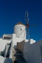 Traditional windmill in Oia town in Santorini island Royalty Free Stock Photo