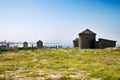 Traditional windmills by the Apulia beach Royalty Free Stock Photo