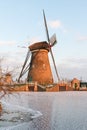 Traditional windmills and frozen canals, Kinderdijk, Netherlands Royalty Free Stock Photo