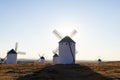 Traditional windmills standing on hillside in Campo de Criptana Royalty Free Stock Photo
