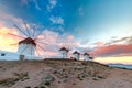 Traditional windmills at sunrise, Mykonos, Greece Royalty Free Stock Photo