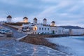 Traditional windmills at sunrise in Mykonos, Greece Royalty Free Stock Photo