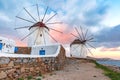 Traditional windmills at sunrise, Santorini, Greece Royalty Free Stock Photo