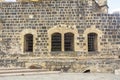 Traditional window in basalt stone wall